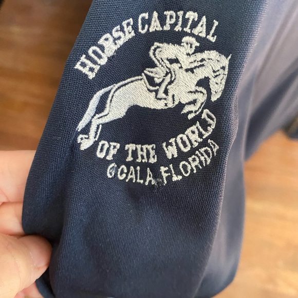 Sunshirt from Ocala - Ladies XS. Plain front and back. Embroidered on sleeve. - Picture 2 of 3